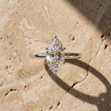 White gold Marquise Cut Solitaire Ring with Cathedral Band and Four-Prong Setting_134
