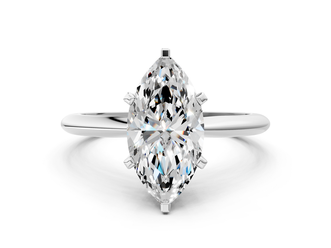 White gold Marquise Cut Solitaire Ring with Four-Prong Setting on a Classic Band_109
