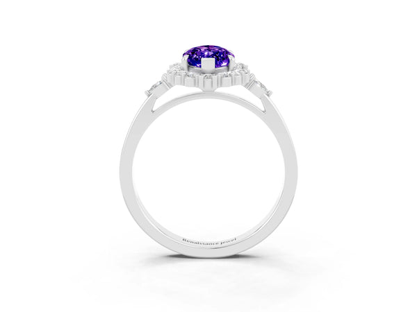White gold Marquise Cut Tanzanite Halo Ring with Pear Side Stones and Prong Setting