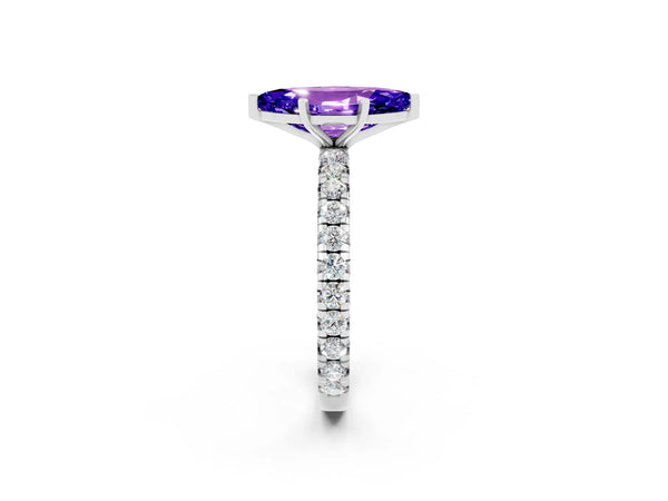 Platinum Marquise Cut Tanzanite Pavé Solitaire Ring with Round Band and Prong Setting