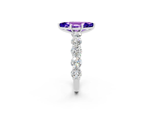 Silver Marquise Cut Tanzanite Prong Setting with Side Stones on a Pave Band