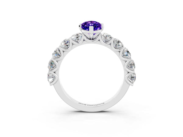 Platinum Marquise Cut Tanzanite Prong Setting with Side Stones on a Pave Band