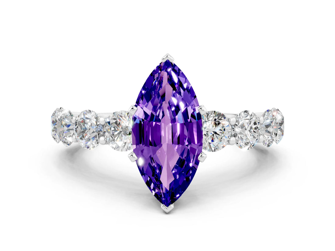 White gold Marquise Cut Tanzanite Prong Setting with Side Stones on a Pave Band