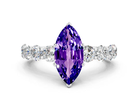 White gold Marquise Cut Tanzanite Prong Setting with Side Stones on a Pave Band