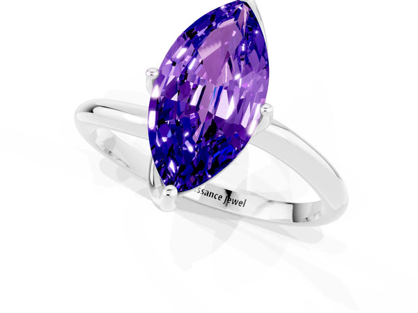 Silver Marquise Cut Tanzanite Solitaire Engagement Ring with Four-Prong Setting and Classic Band