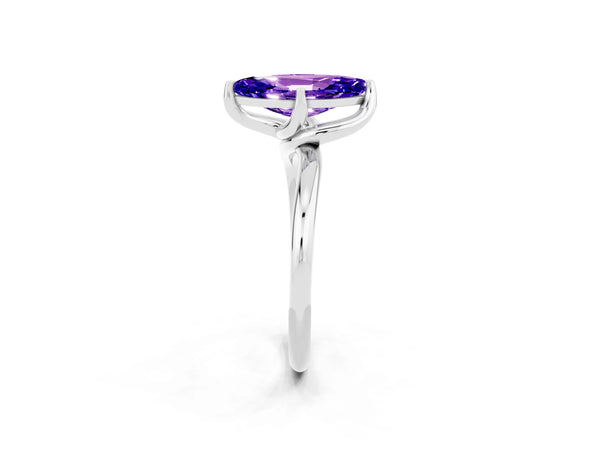 White gold Marquise Cut Tanzanite Solitaire Engagement Ring with Four-Prong Setting and Classic Band