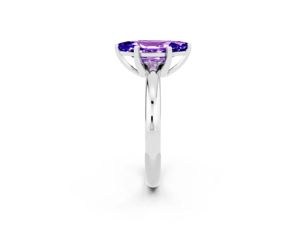 Platinum Marquise Cut Tanzanite Solitaire Engagement Ring with Round Band and Four-Prong Setting