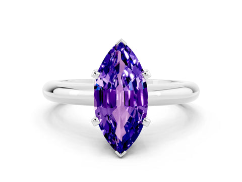 White gold Marquise Cut Tanzanite Solitaire Engagement Ring with Round Band and Four-Prong Setting