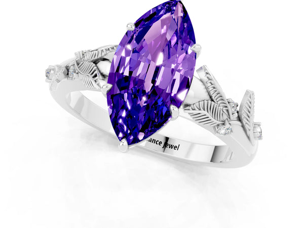 Platinum Marquise Cut Tanzanite Solitaire Ring with Leaf Motif Band and Four-Prong Setting