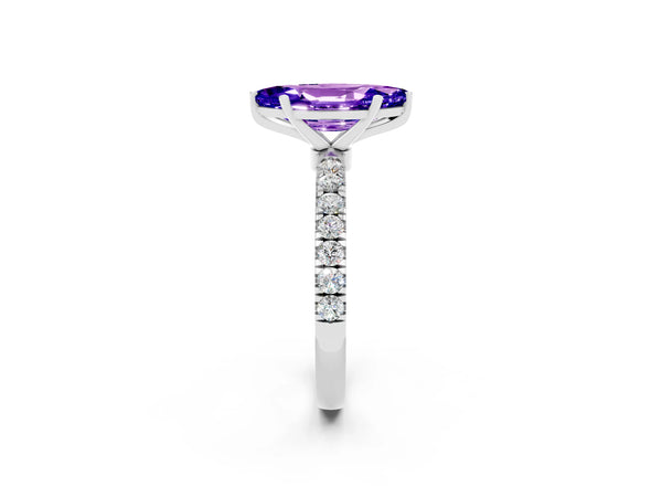 Silver Marquise Cut Tanzanite Solitaire Ring with Pavé Accents and Four-Prong Setting