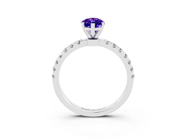 White gold Marquise Cut Tanzanite Solitaire Ring with Pavé Accents and Four-Prong Setting