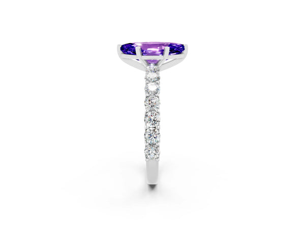 White gold Marquise Cut Tanzanite Solitaire Ring with Shared Prong Pavé Band and Four-Prong Setting