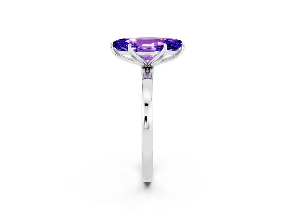 Silver Marquise Cut Tanzanite Solitaire Ring with Thin Band and Prong Setting