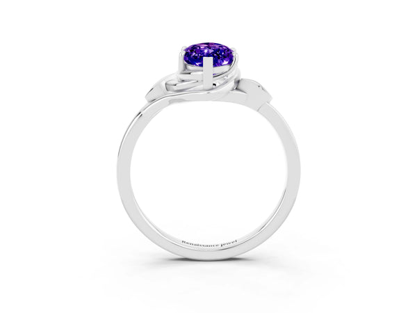 Silver Marquise Cut Tanzanite Solitaire Ring with Twist Band and Four-Prong Setting