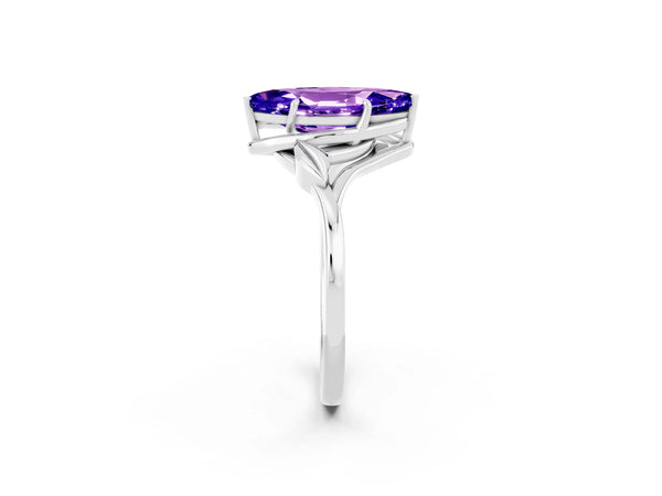 White gold Marquise Cut Tanzanite Solitaire Ring with Twist Band and Four-Prong Setting