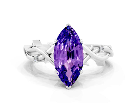White gold Marquise Cut Tanzanite Solitaire Ring with Twisted Band and Prong Setting