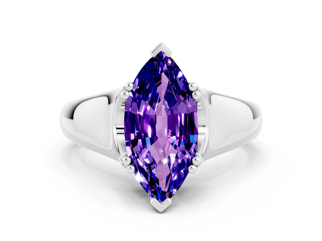 White gold Marquise Cut Tanzanite Solitaire Ring with Wide Band and Prong Setting