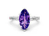 White gold Marquise Cut Tanzanite Solitaire with Side Baguettes and Channel Set Band