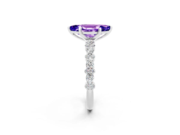 White gold Marquise Cut Tanzanite Side Stone Solitaire Ring with Round  and Four-Prong Setting