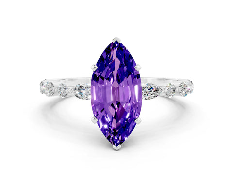White gold Marquise Cut Tanzanite Solitaire with Side Stones on a Pavé Band and Four-Prong Setting