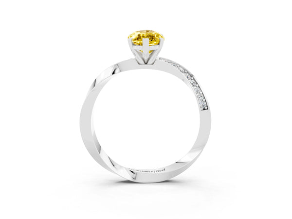 White gold Marquise Cut Yellow Sapphire Engagement Ring with Side Stone Accents and Four-Prong Setting