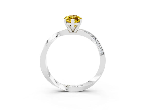 Silver Marquise Cut Yellow Sapphire Engagement Ring with Side Stone Accents and Four-Prong Setting