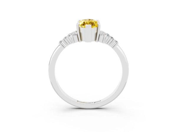 Platinum Marquise Cut Yellow Sapphire Ring with Side Stones and Four-Prong Setting