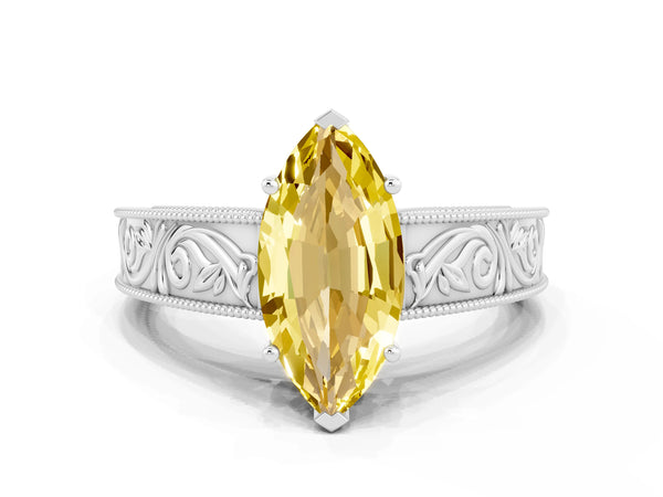 Platinum Marquise Cut Yellow Sapphire Solitaire Ring with Engraved Band and Four-Prong Setting