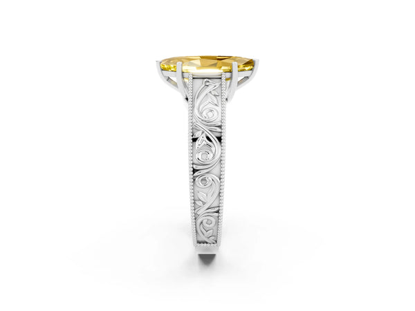 Platinum Marquise Cut Yellow Sapphire Solitaire Ring with Engraved Band and Four-Prong Setting