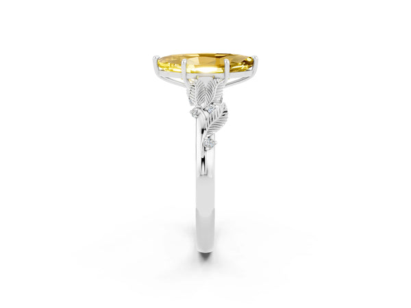 White gold Marquise Cut Yellow Sapphire Solitaire Ring with Leaf Motif Band and Four-Prong Setting