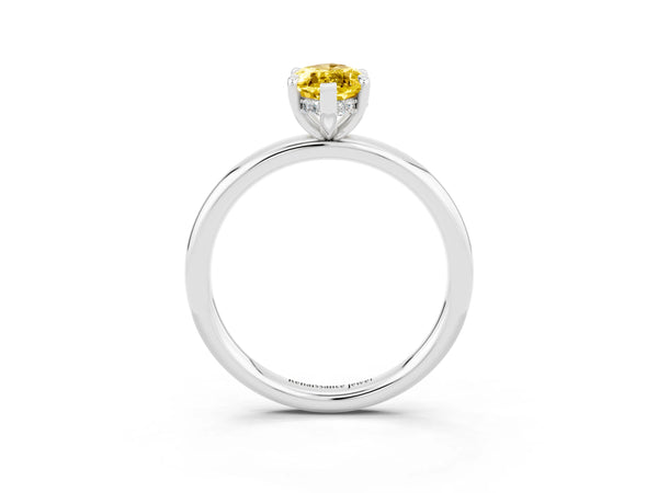 Platinum Marquise Cut Yellow Sapphire Solitaire Ring with Thin Band and Four-Prong Setting