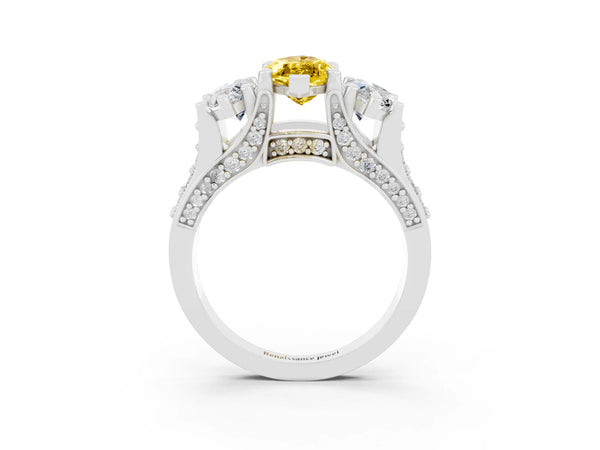 White gold Marquise Cut Yellow Sapphire Three-Stone Ring with Channel Set Band and Four-Prong Setting