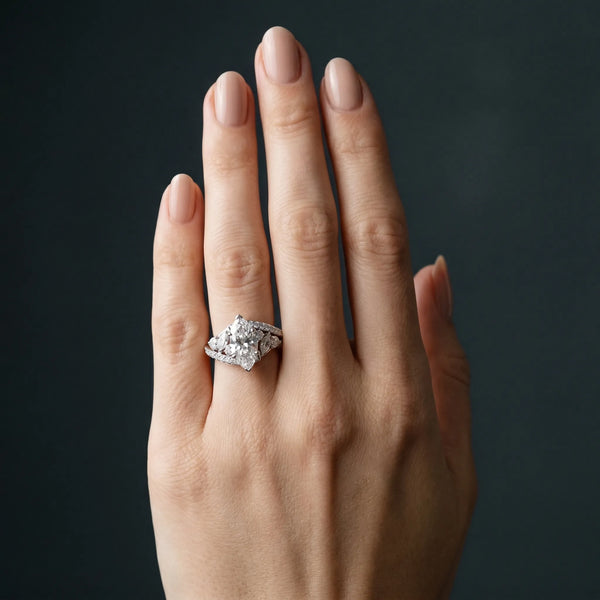 White gold Marquise Diamond Halo Ring with Marquise and Pavé Band in Prong Setting