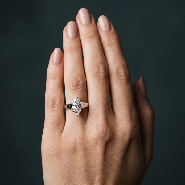 White gold Marquise Diamond Solitaire Ring with Tapered Band and Prong Setting