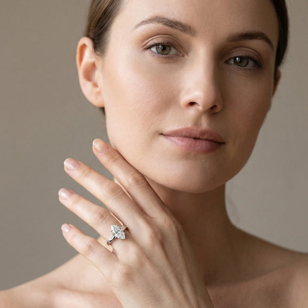 White gold Marquise Diamond Solitaire Ring with Tapered Band and Prong Setting