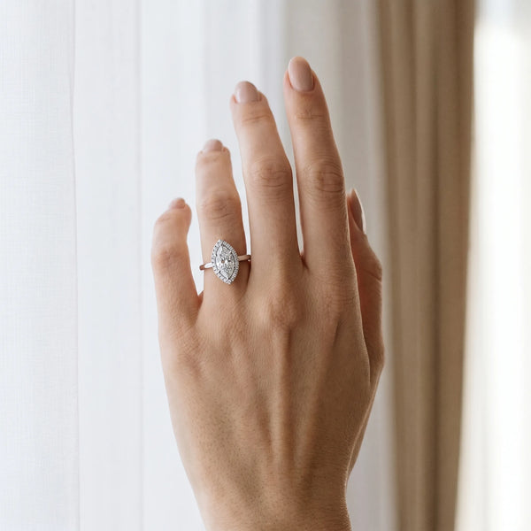 White gold Marquise Halo Diamond Solitaire with Pavé Band and Four-Prong Setting