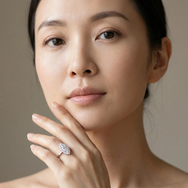 White gold Marquise Halo Diamond Solitaire with Pavé Band and Four-Prong Setting