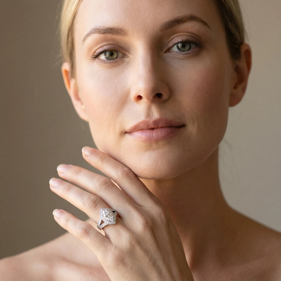 White gold Marquise Halo Split Shank Diamond Ring with Milgrain Prong Setting