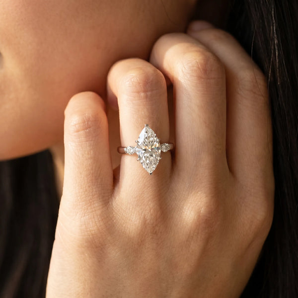 White gold Marquise Solitaire Beaded Band with Four-Prong Setting