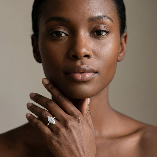 White gold Marquise Solitaire Diamond Engagement Ring with Pave Band and Six-Prong Setting