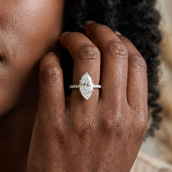 White gold Marquise Solitaire Diamond Engagement Ring with Pave Band and Six-Prong Setting