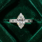 White gold Marquise Solitaire Diamond Ring with Channel-Set Baguette Band and Four-Prong Setting_16