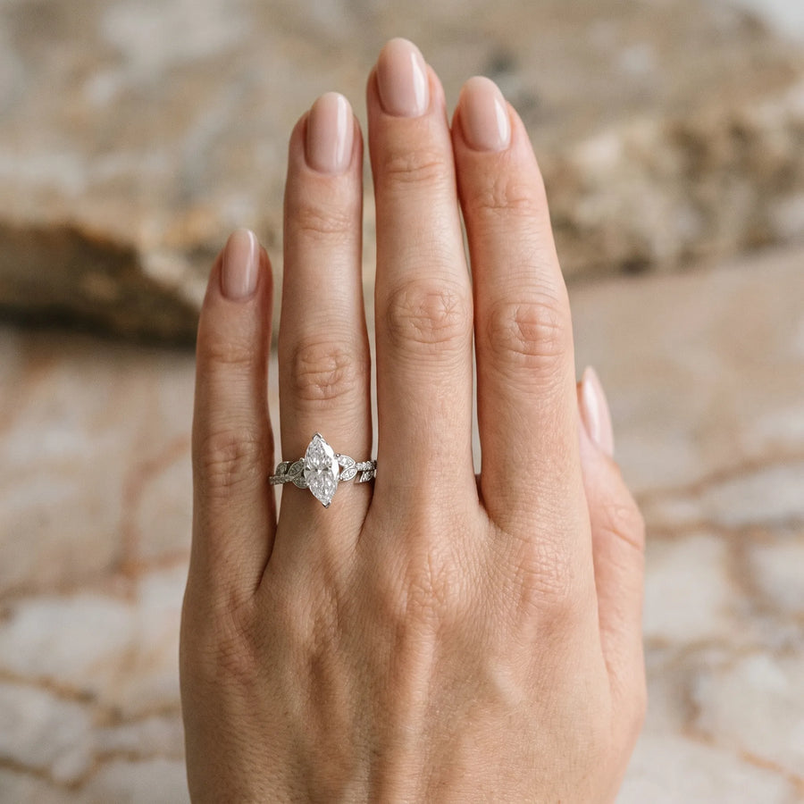 White gold Marquise Solitaire Leaf-Inspired Diamond Ring with Pavé Band and Four-Prong Setting