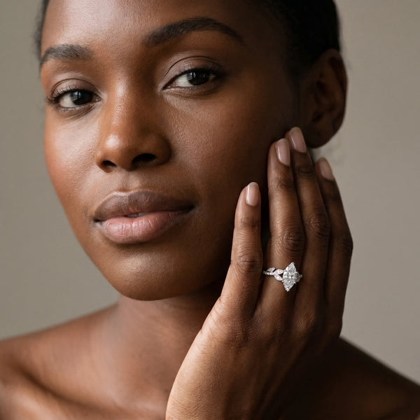 White gold Marquise Solitaire Leaf-Inspired Diamond Ring with Pavé Band and Four-Prong Setting