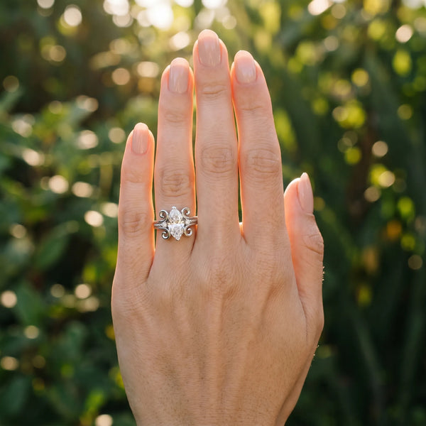 White gold Marquise Solitaire Twisted Band Scroll Prong Ring