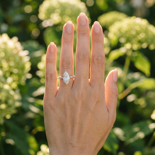 White gold Marquise Solitaire Twisted Band with Bead Prong Setting