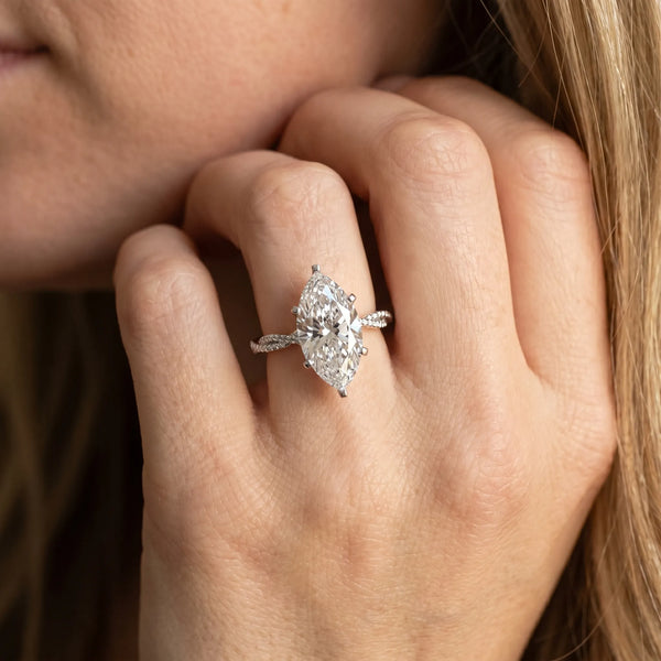White gold Marquise Solitaire Twisted Band with Bead Prong Setting