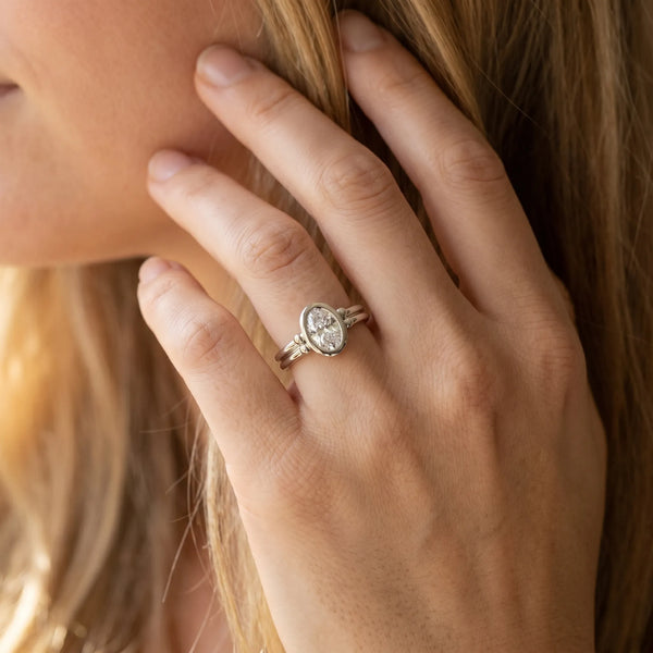White gold Oval Bezel Solitaire Ring with Split Shank Band