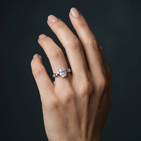 White gold Oval Brilliant Channel-Set Diamond Ring with Bezel Prong Setting