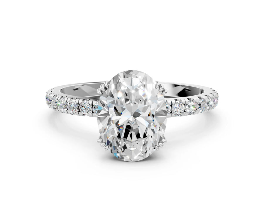 White gold Oval Brilliant Solitaire with Pavé Band and Claw Prong Setting
